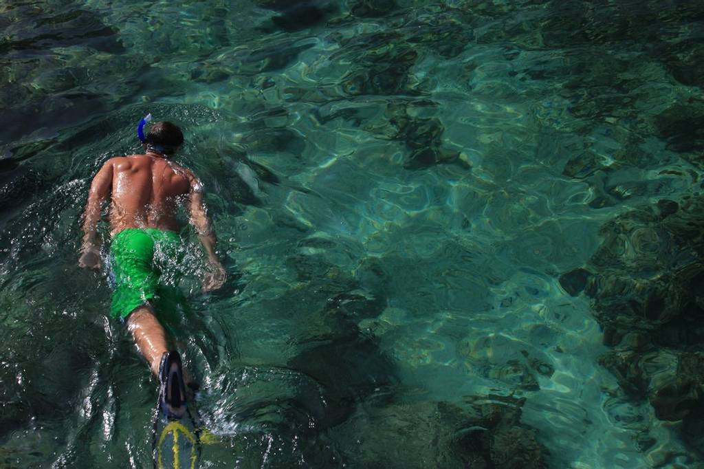Man snorkelling at Six Senses Zighy Bay, Turkey