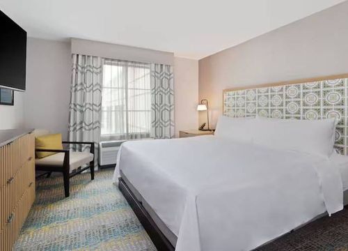 Homewood Suites by Hilton St. Augustine San Sebastian king deluxe.jpg