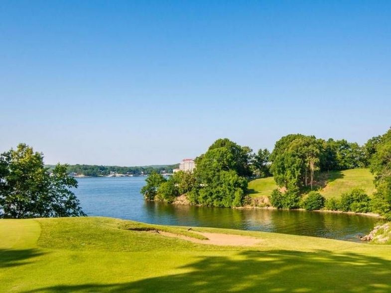 The Lodge of Four Seasons golf course with lake.jpg