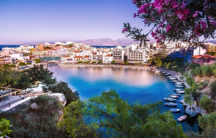 The lake Voulismeni in Agios Nikolaos, a picturesque town in the eastern part of the island Crete, Greece The lake Voulismeni in Agios Nikolaos, a picturesque town in the eastern part of the island Crete, Greece