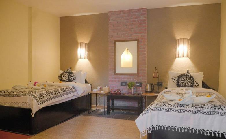 Sapana Village Lodge Chitwan twin bedroom.jpeg