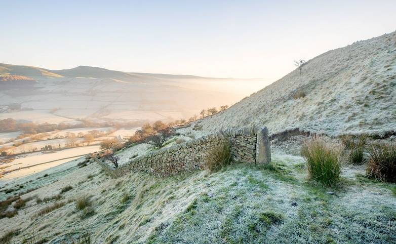 Dry stone wall on a frosty morning at Cracken Edge in the High Peak District, England