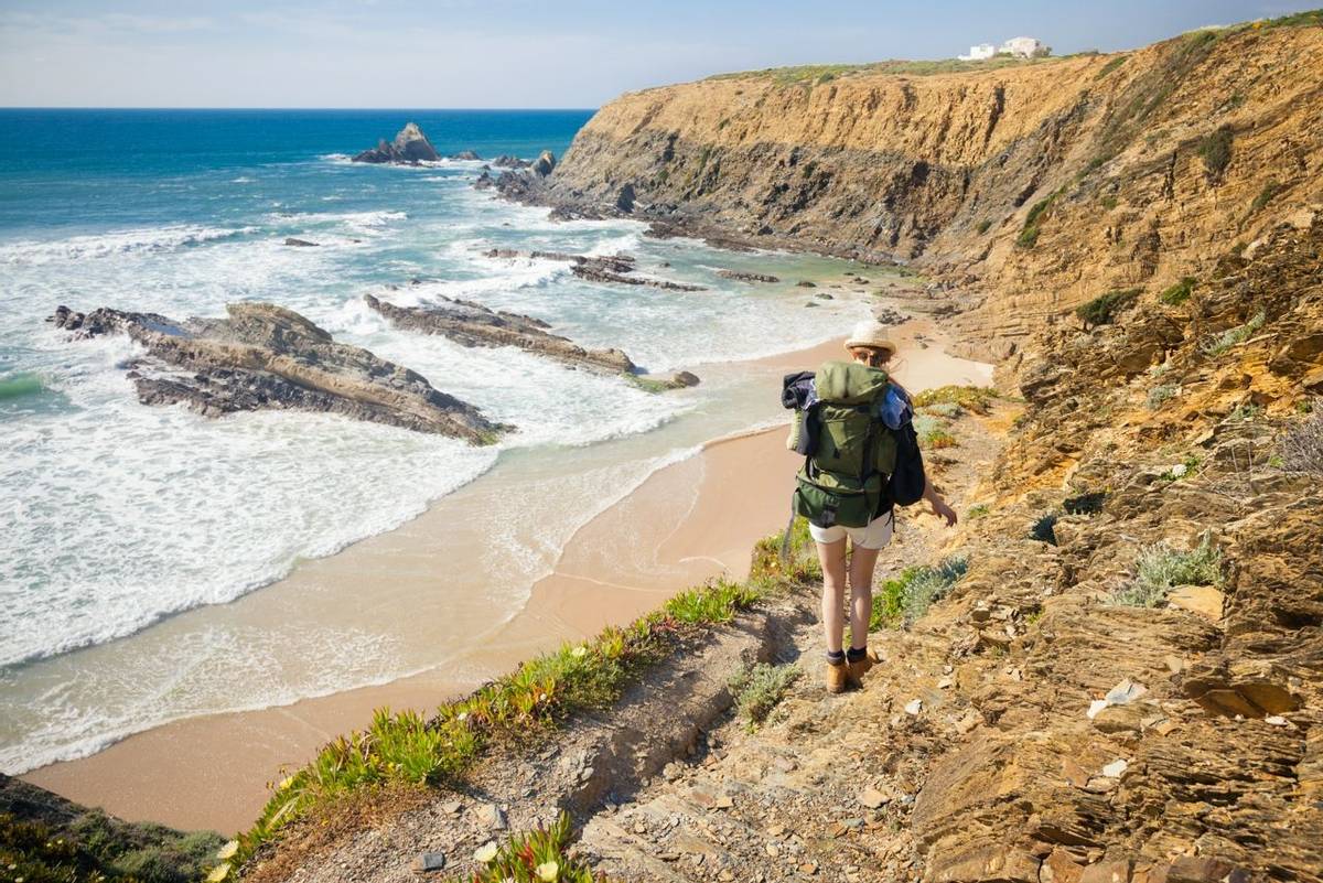 hiker on hiking trail  coast portugal , rota vicentina. HDR image