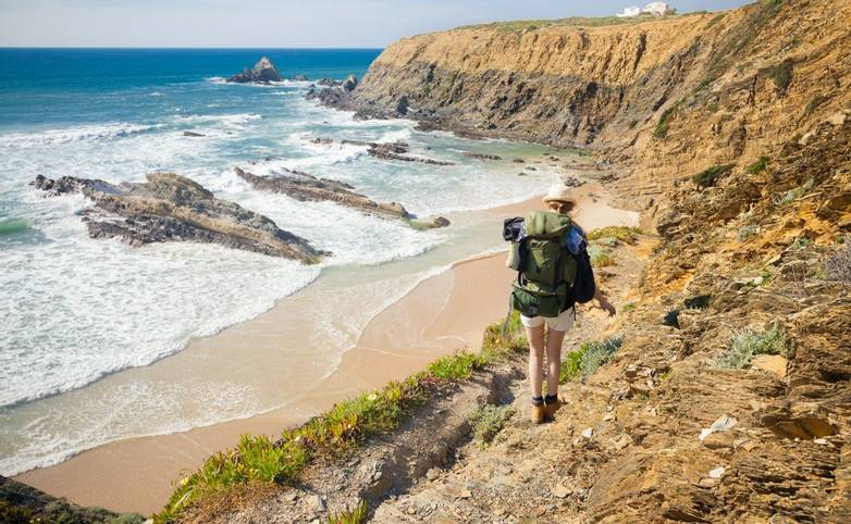 hiker on hiking trail  coast portugal , rota vicentina. HDR image