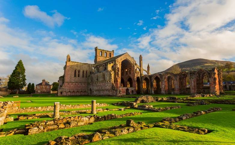 Ruins of Melrose Abbey in the Scottish Borders region in Scotland.