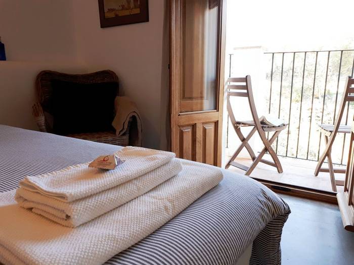 Finca Flores Amarillas Bedroom with Balcony.jpg