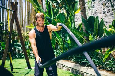 Man exercising with skipping ropes