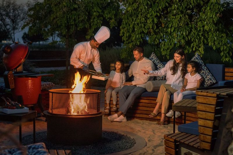 A family at a luxury resort eating