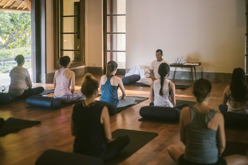 Group yoga at REVIVO Resort.
