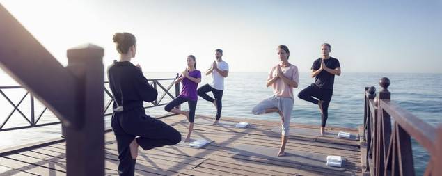 Group yoga at Marbella