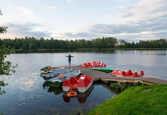 woman by lake at Vilnius grand resort