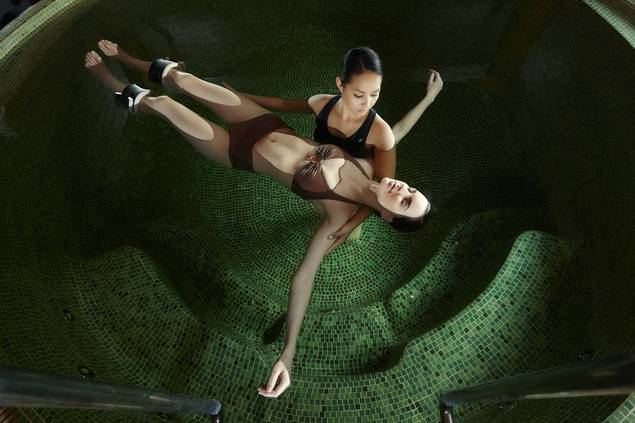A woman floating in a therapy session at Chiva Som International Health Resort 