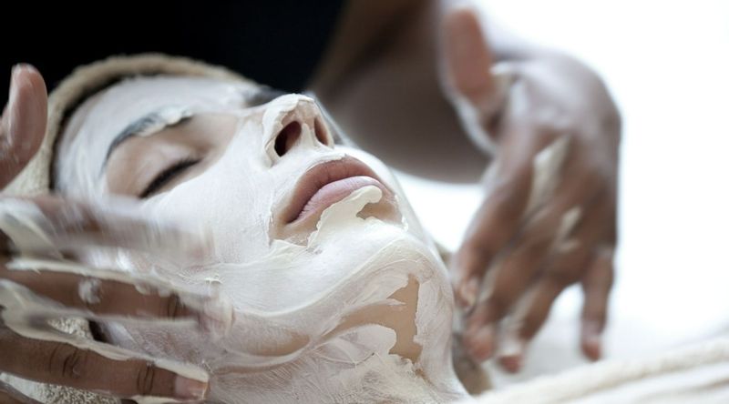 Facial massage with face mask at a wellness retreat