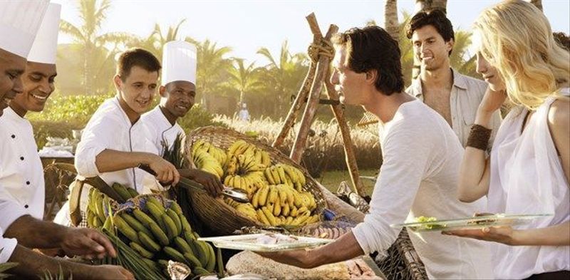 Chefs serving healthy organic food at Shanti Maurice Resort and Spa