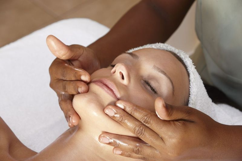 Woman receiving a facial at The BodyHoliday in St Lucia