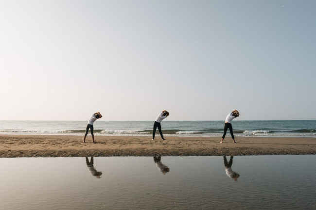 Stretching by The Sea