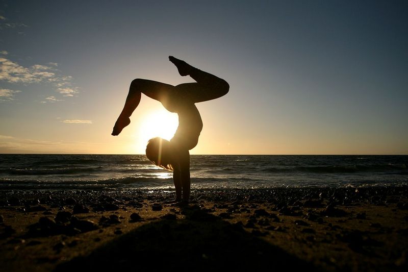yoga pose sunset