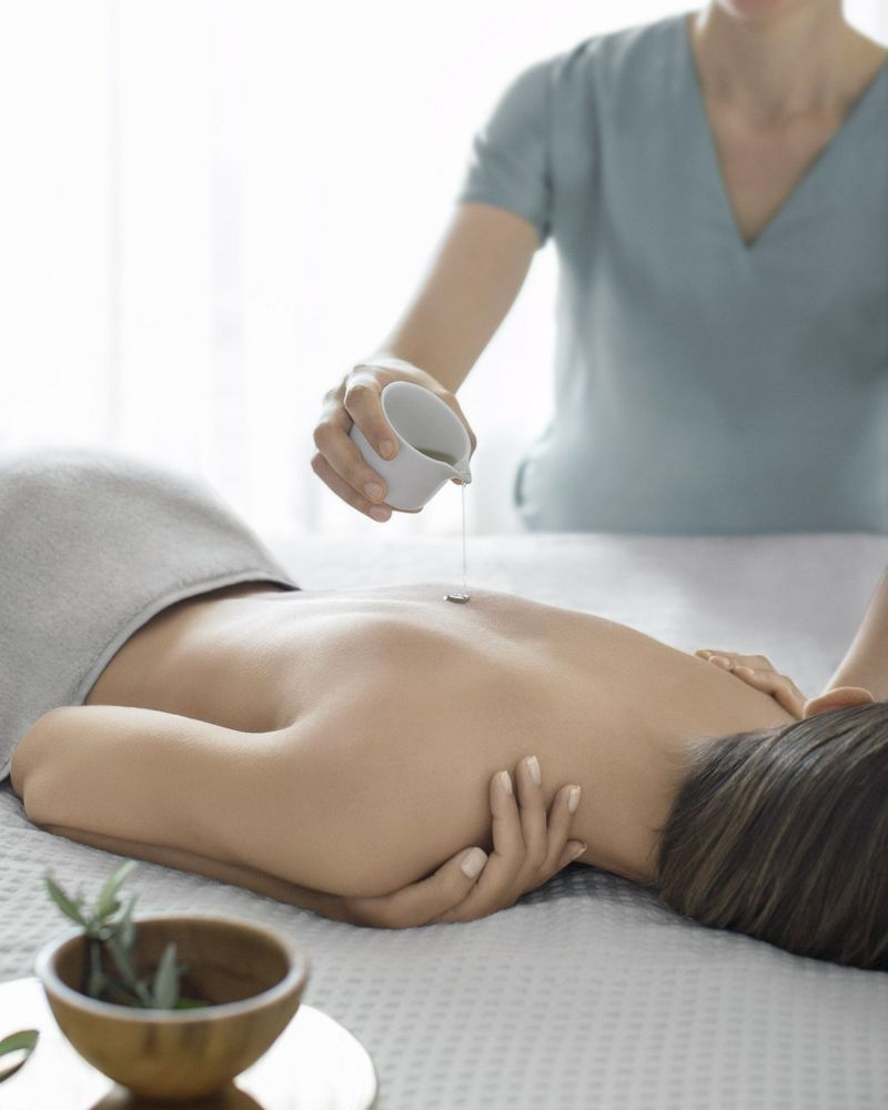 Woman receiving a massage at Lefay Resort and Spa Lago di Garda, a top beauty spa